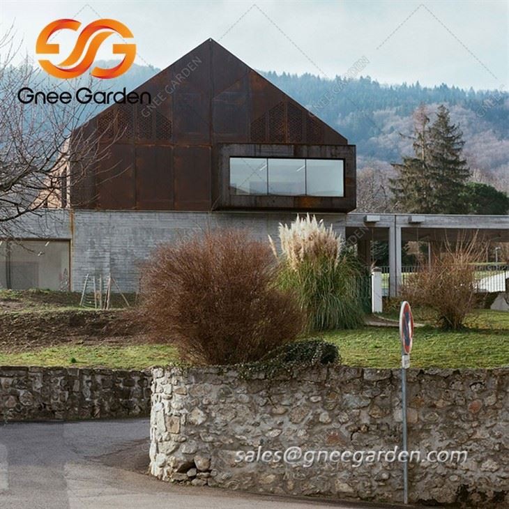 Corten-Steel-and-Concrete-School-Overlooks-Lake-(3)